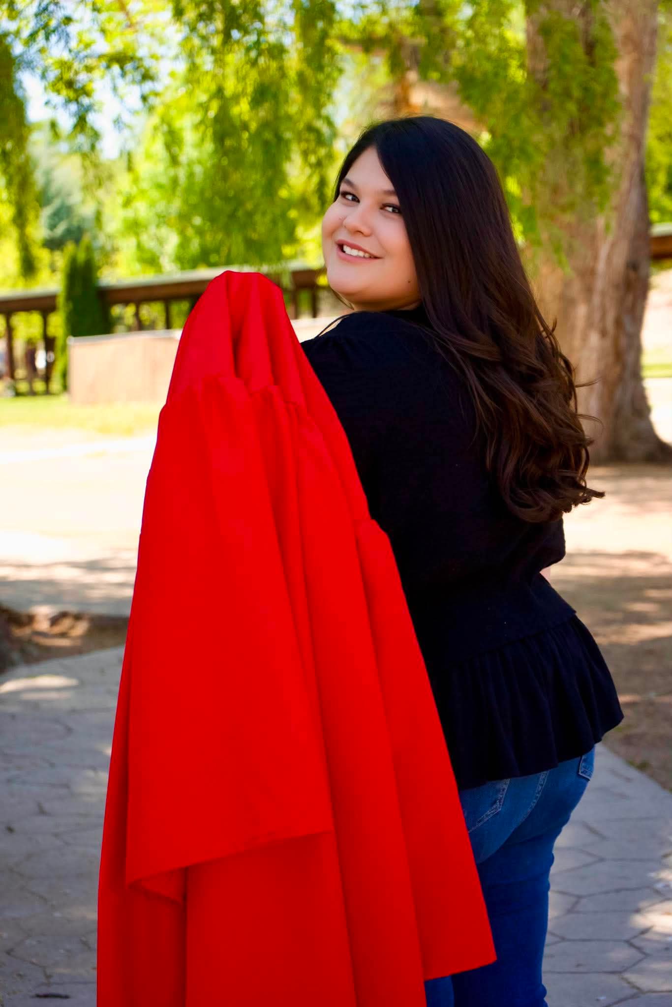 Graduation portrait, red gown