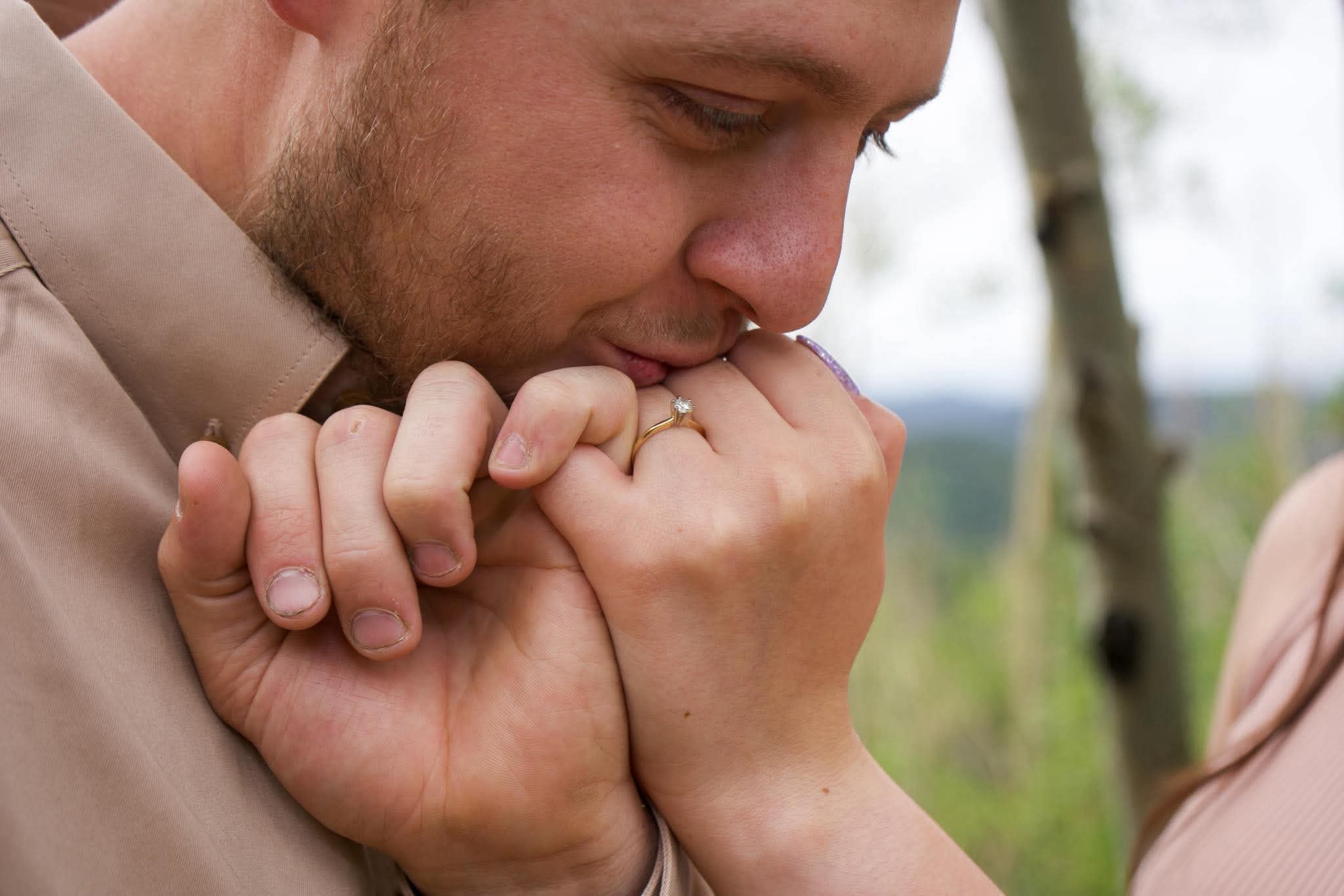 A tender moment with a new ring