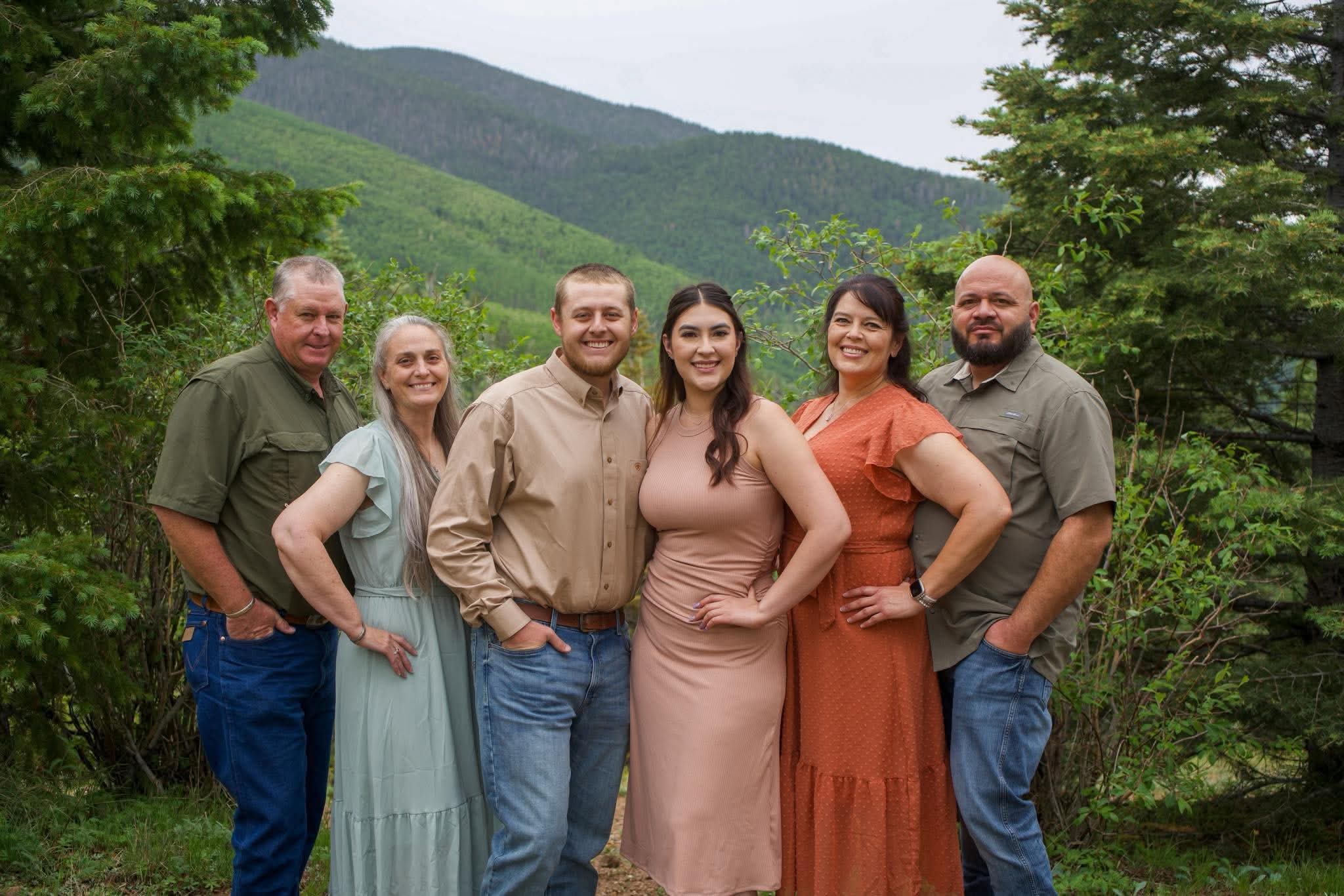 An extended family portrait in the mountains